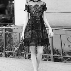 Black lace metisu boutique dress.